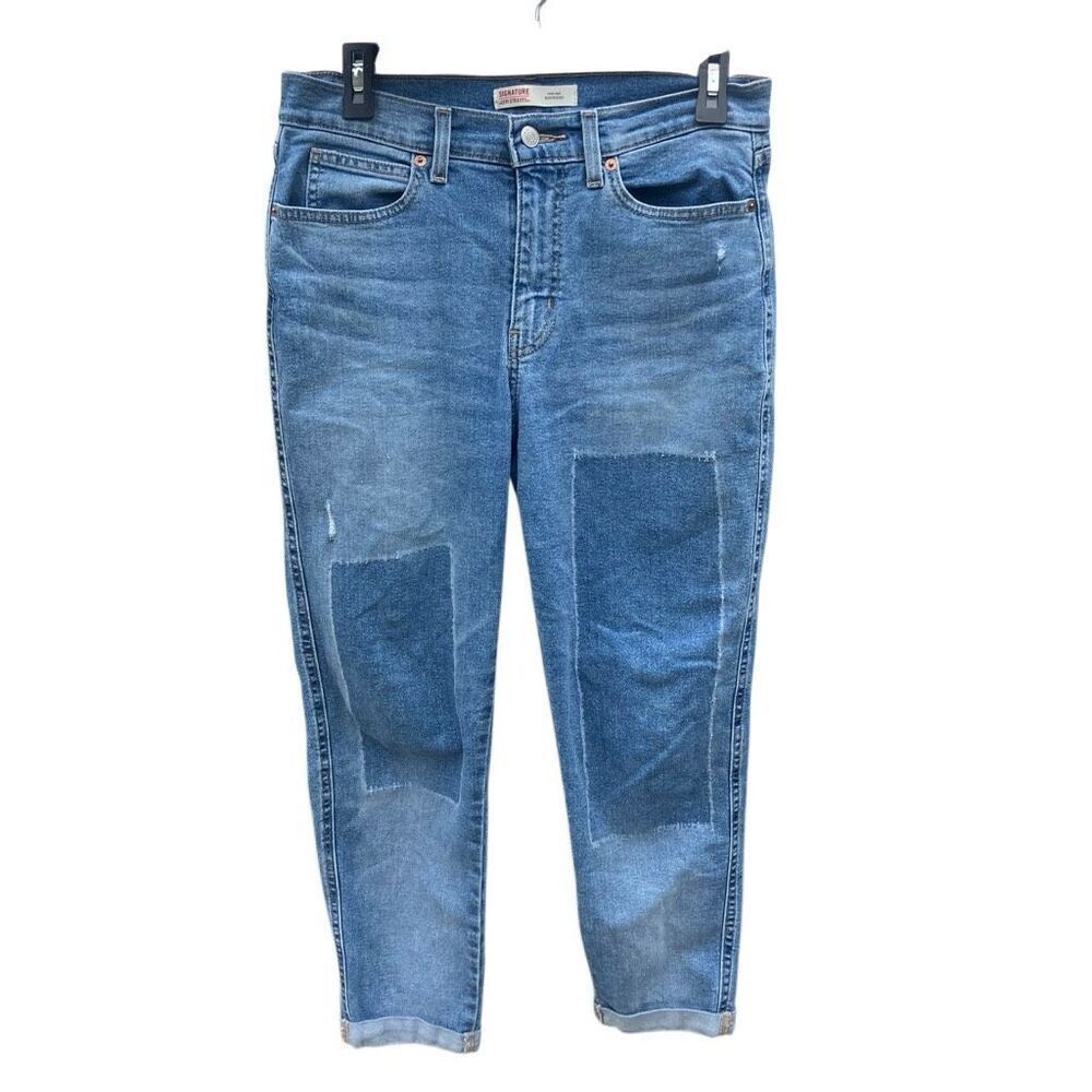 Levi’s signature “heritage boyfriend” medium wash cuffed jeans size 4/27 # 637
